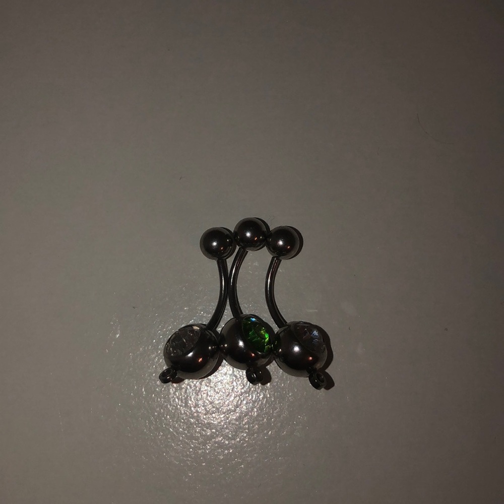3 belly button piercings